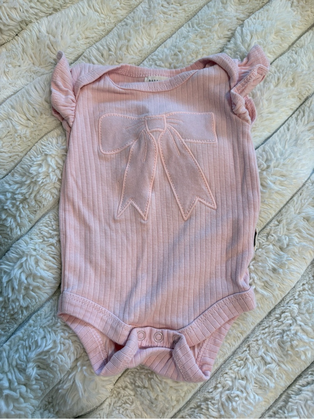 7/$30 Rabbit + Bear Pink Ribbed Bow One-Piece Bodysuit for Kids